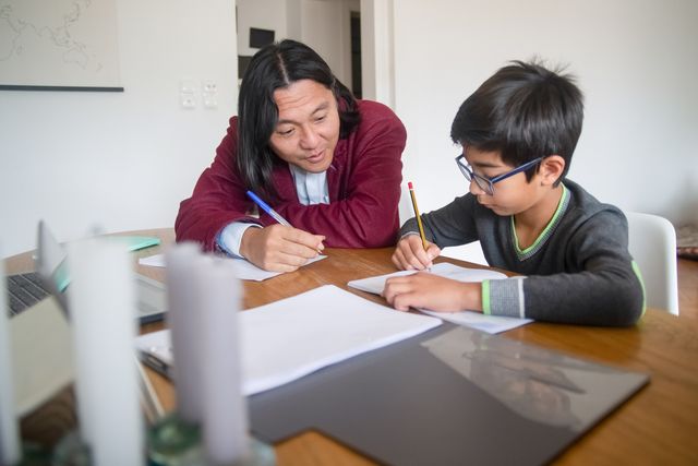Photo by Kampus Production: https://www.pexels.com/photo/a-teacher-teaching-a-boy-7079148/